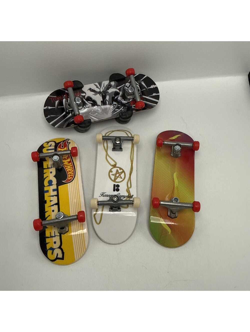 Lot of 4 Fingerboards - Hot Wheels Skate Tony Hawk Birdhouse Decks & Tech Deck